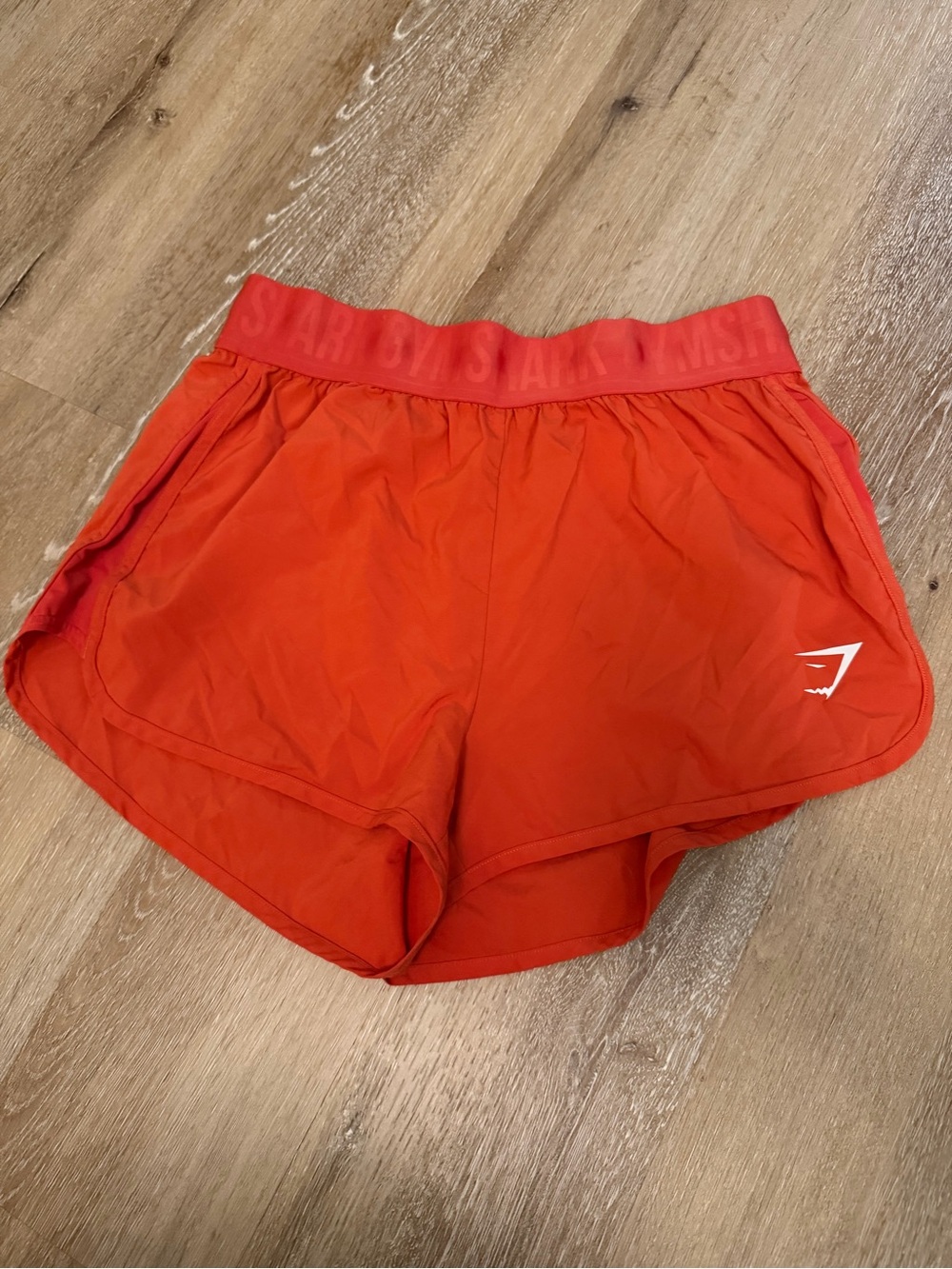 Gymshark Women’s Orange Athletic Running Shorts